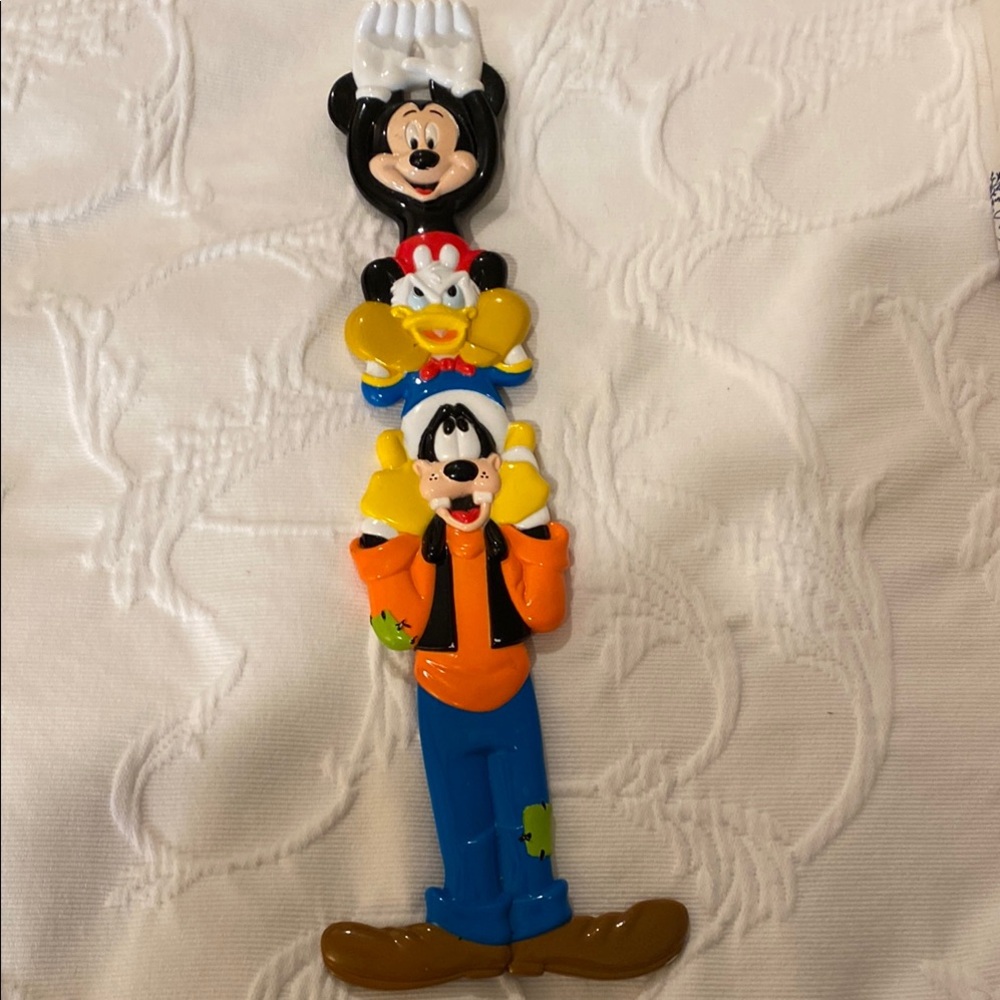 Disney Stackable Character Figurine - Black, Red, Blue, Orange back scratcher